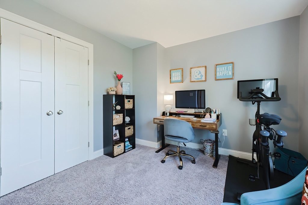 131 Pommogussett Road Rutland, MA 01543 - Photo 21 of 38 a workspace with a couch