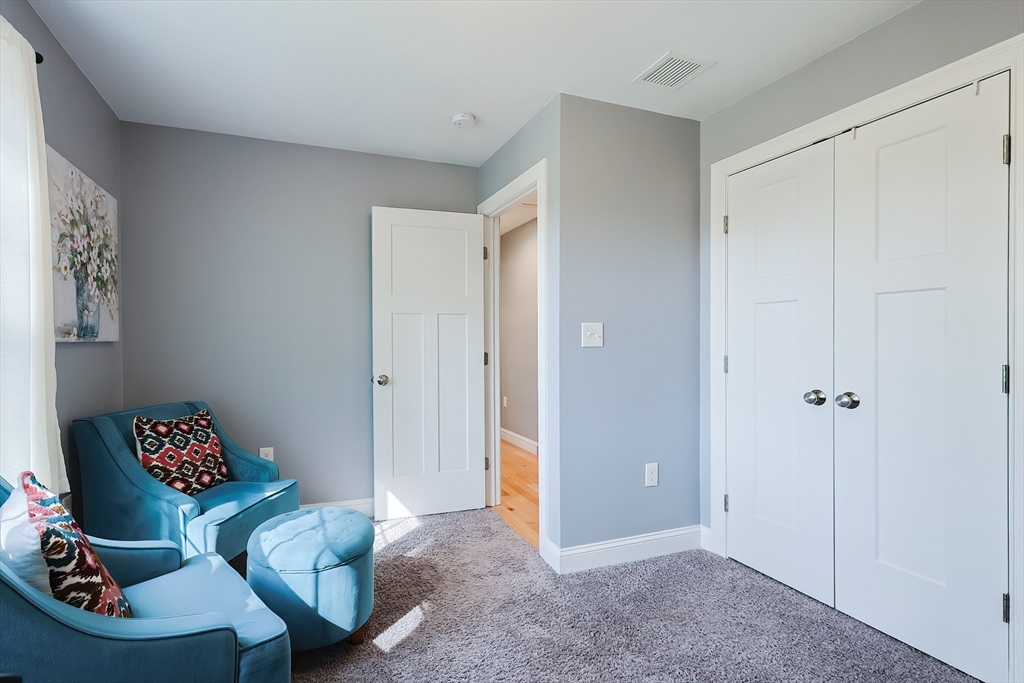 131 Pommogussett Road Rutland, MA 01543 - Photo 22 of 38 a living room with furniture and a closet
