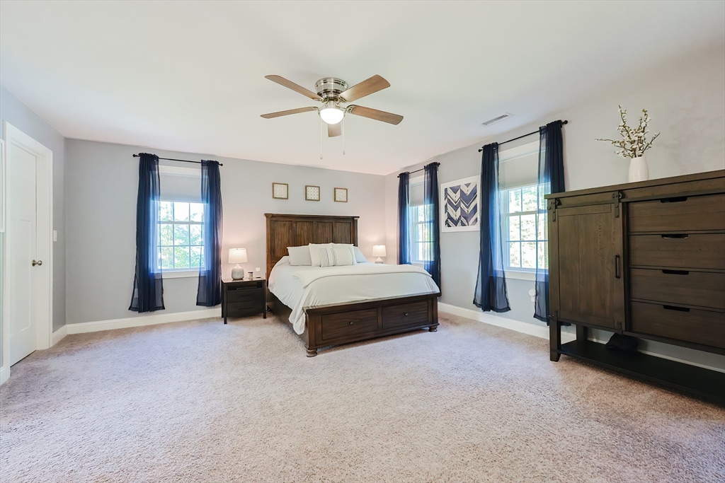 131 Pommogussett Road Rutland, MA 01543 - Photo 25 of 38 a bedroom with a bed and window