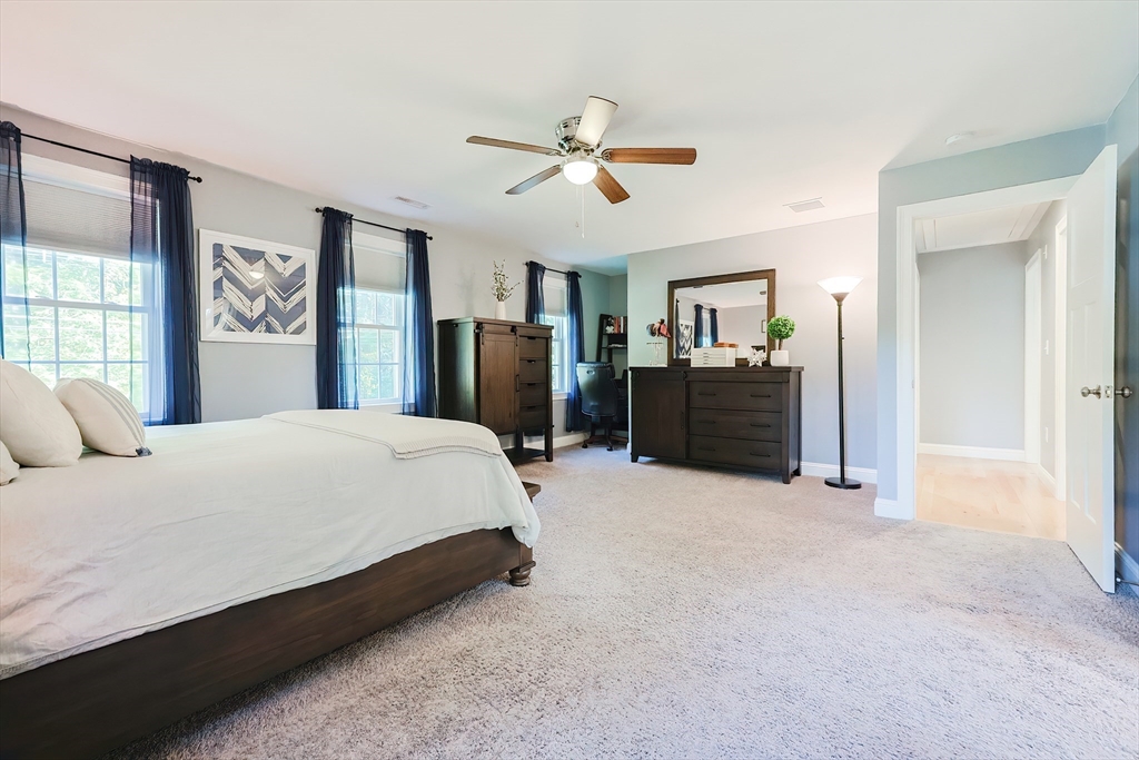 131 Pommogussett Road Rutland, MA 01543 - Photo 26 of 38 a bed room with a bed and dresser