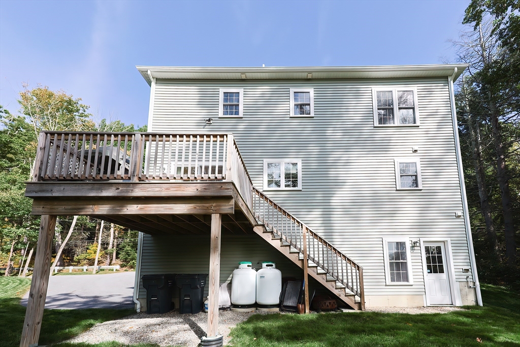 131 Pommogussett Road Rutland, MA 01543 - Photo 35 of 38 a view of house with roof deck and entertaining space