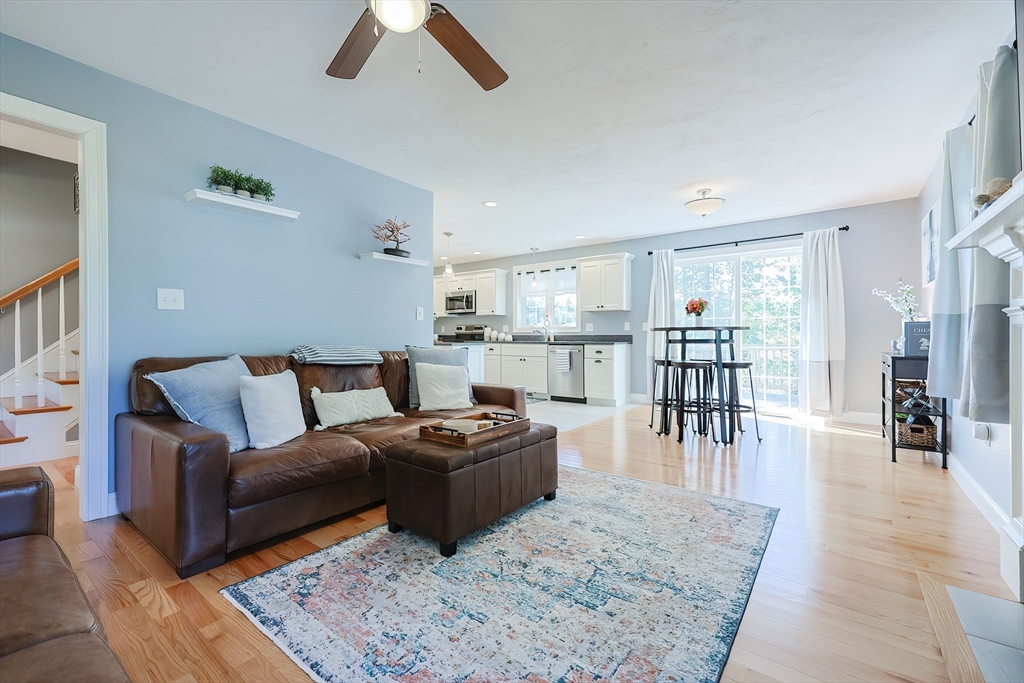 131 Pommogussett Road Rutland, MA 01543 - Photo 5 of 38 a living room with furniture and a wooden floor