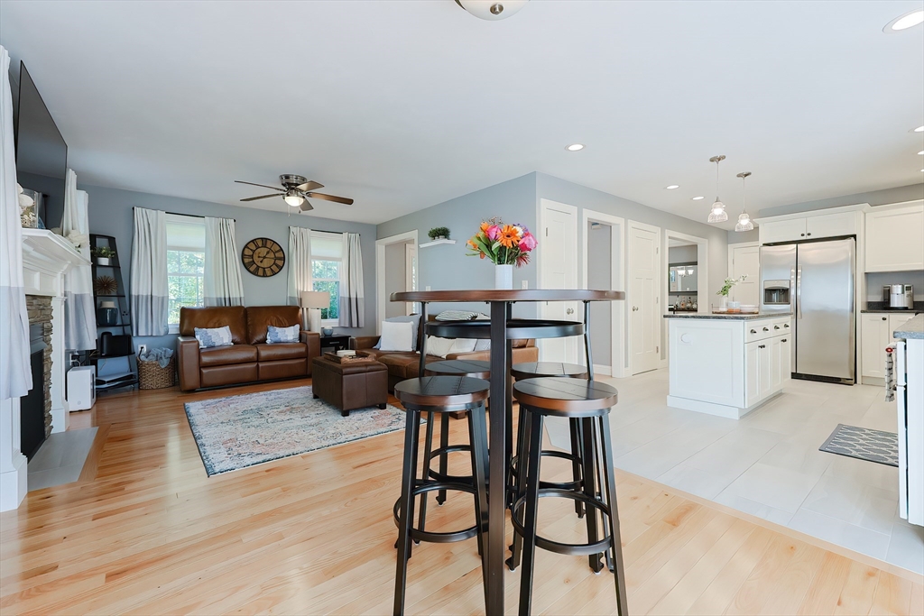 131 Pommogussett Road Rutland, MA 01543 - Photo 7 of 38 a living room with furniture kitchen view and a refrigerator