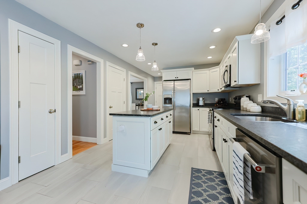 131 Pommogussett Road Rutland, MA 01543 - Photo 9 of 38 a kitchen with stainless steel appliances granite countertop refrigerator sink and cabinets