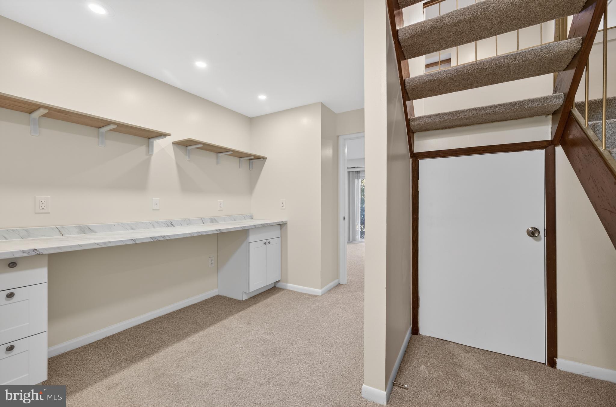 9250 Three Oaks Drive Silver Spring, MD 20901 - Photo 32 of 45 a view of walk in closet with empty racks