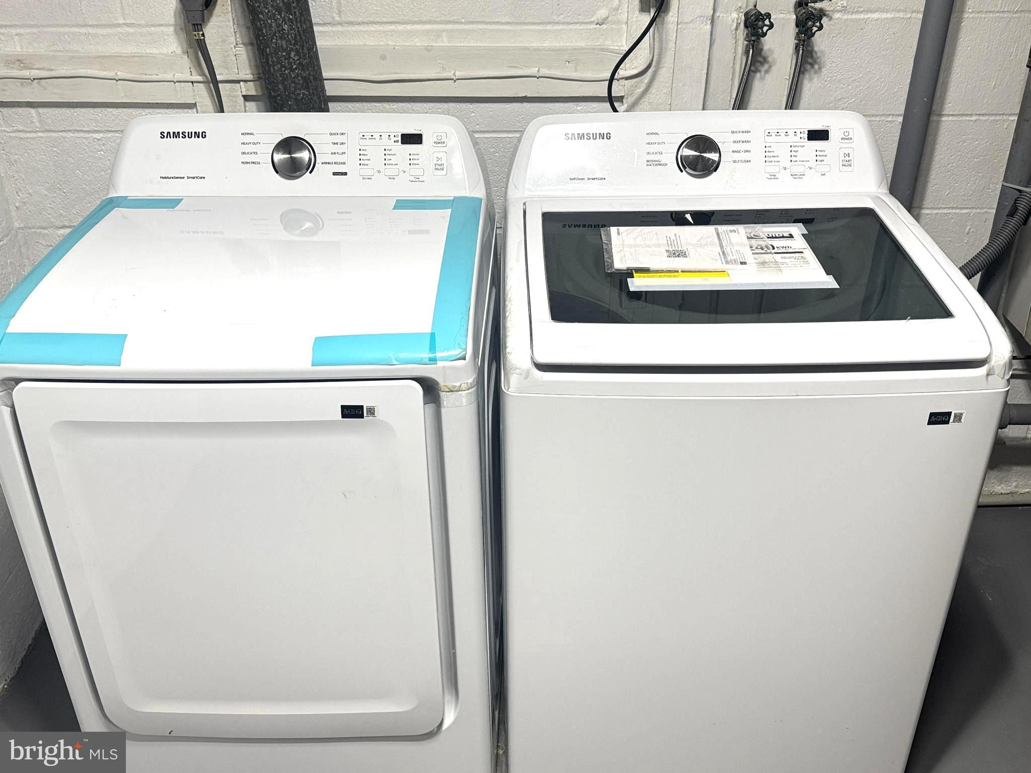 9250 Three Oaks Drive Silver Spring, MD 20901 - Photo 39 of 45 a utility room with dryer and washer