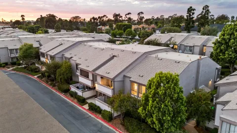 an aerial view of a house with a garden