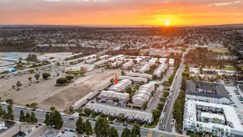 an aerial view of residential building and parking space