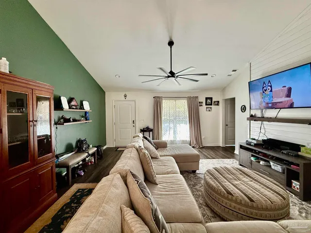 a bed room with bed and window