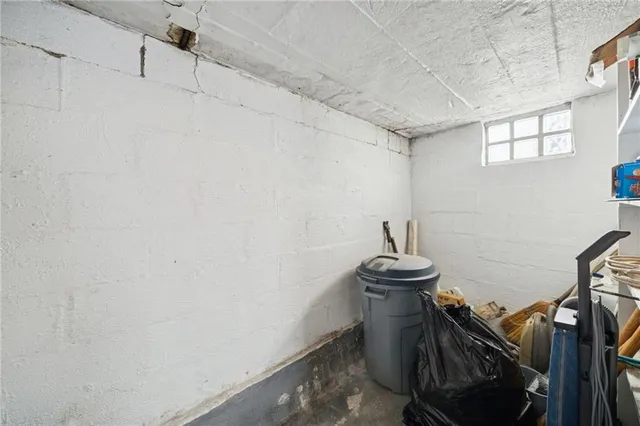 a bathroom with a sink dryer and washer