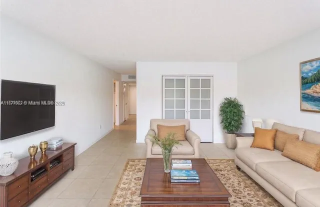 $209,500 | 873 Northeast 195th Street, Unit 107, Miami, FL 33179