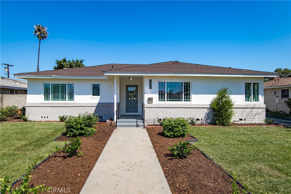 5339 Rochester Street Riverside, CA 92504 - Photo 1 of 1 a front view of a house with a garden