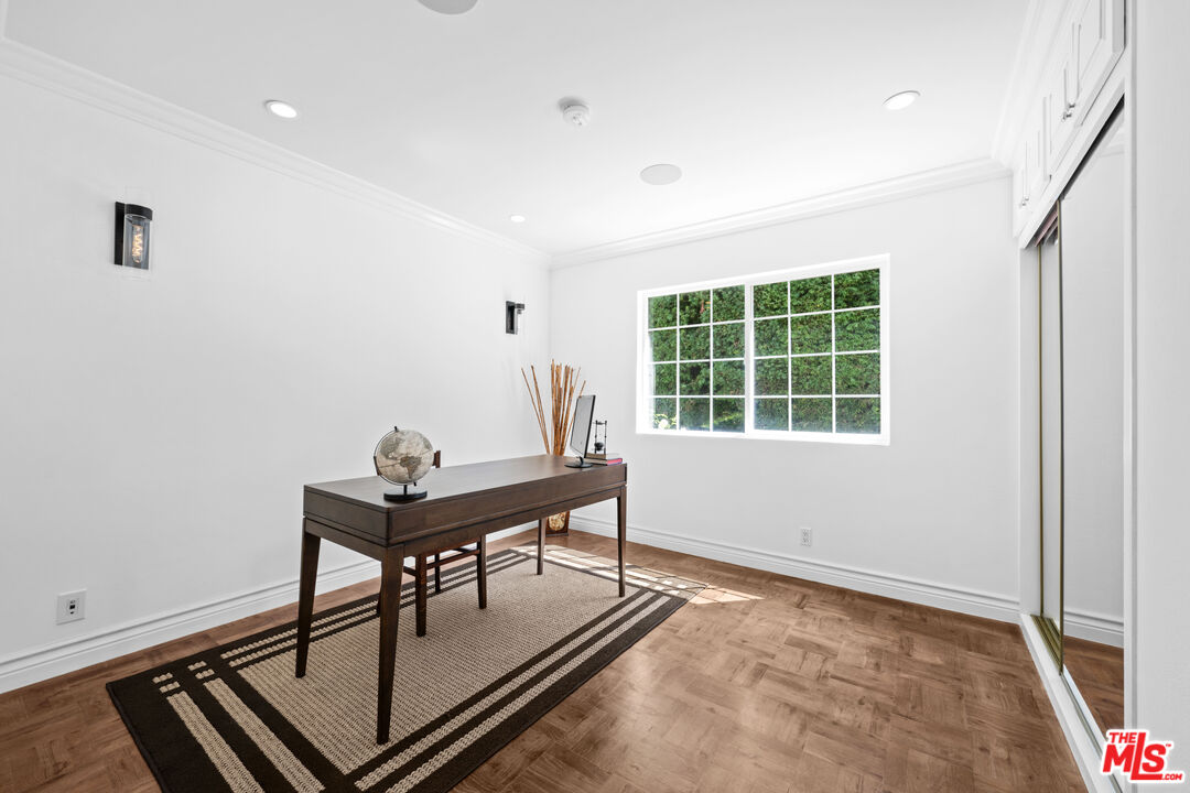 2563 Hutton Drive Beverly Hills, CA 90210 - Photo 22 of 69 a view of a workspace with furniture and a window