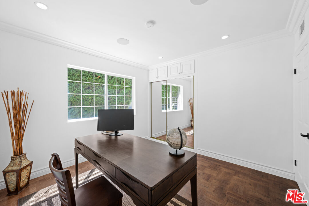 2563 Hutton Drive Beverly Hills, CA 90210 - Photo 23 of 69 a view of a workspace with furniture and a window