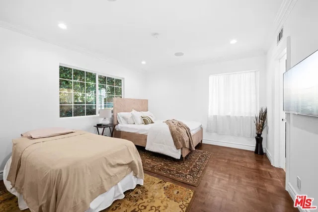 a view of a livingroom with wooden floor