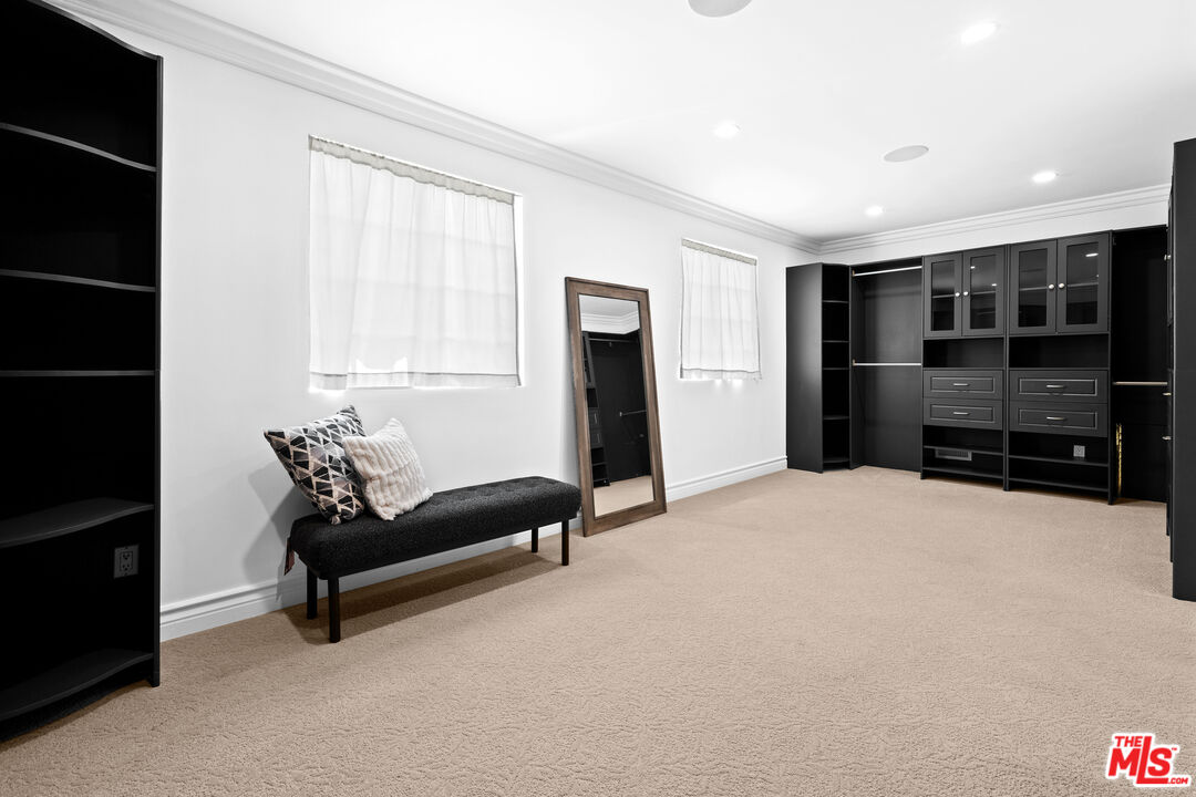 2563 Hutton Drive Beverly Hills, CA 90210 - Photo 41 of 69 a living room with furniture and a flat screen tv