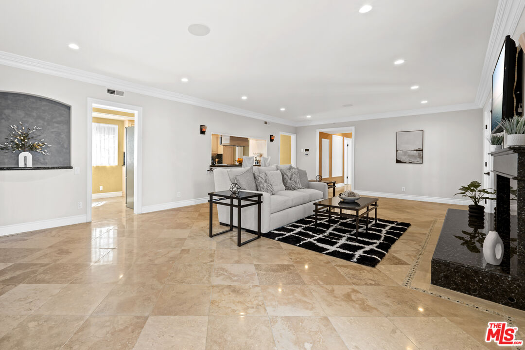 2563 Hutton Drive Beverly Hills, CA 90210 - Photo 5 of 69 a living room with furniture and a rug