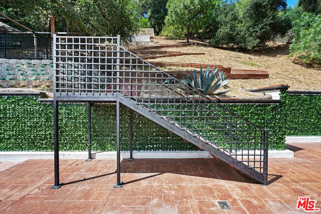 2563 Hutton Drive Beverly Hills, CA 90210 - Photo 55 of 69 a view of a balcony with wooden floor