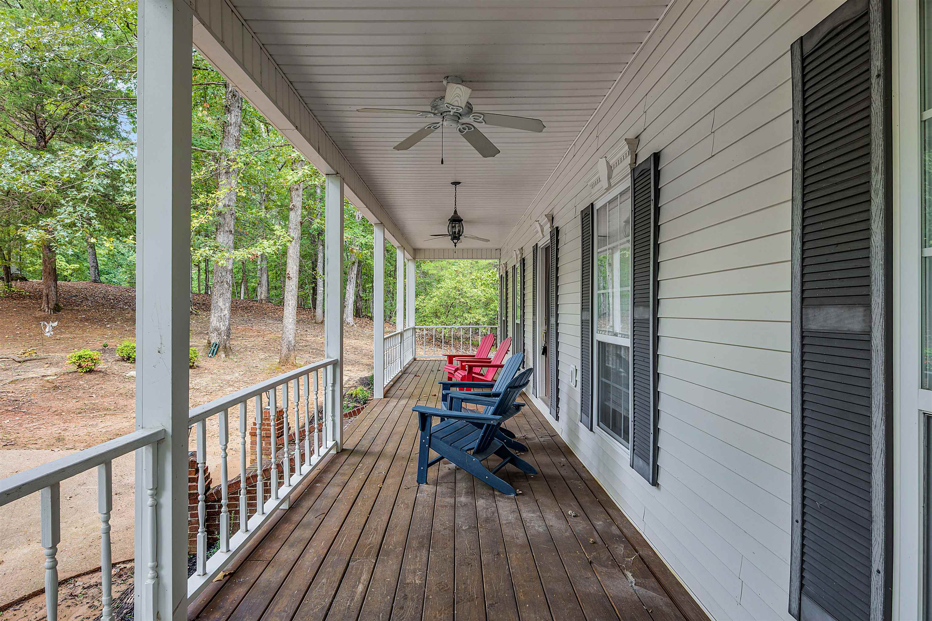 405 Anderson Hollow Road Savannah, TN 38372 - Photo 4 of 34 a view of a porch with wooden floor and outdoor space