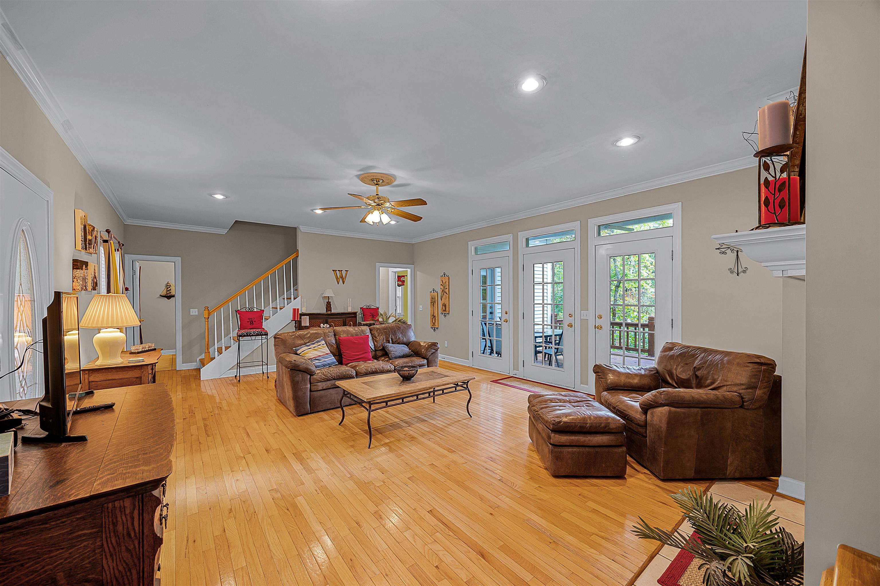 405 Anderson Hollow Road Savannah, TN 38372 - Photo 5 of 34 a living room with furniture and a flat screen tv