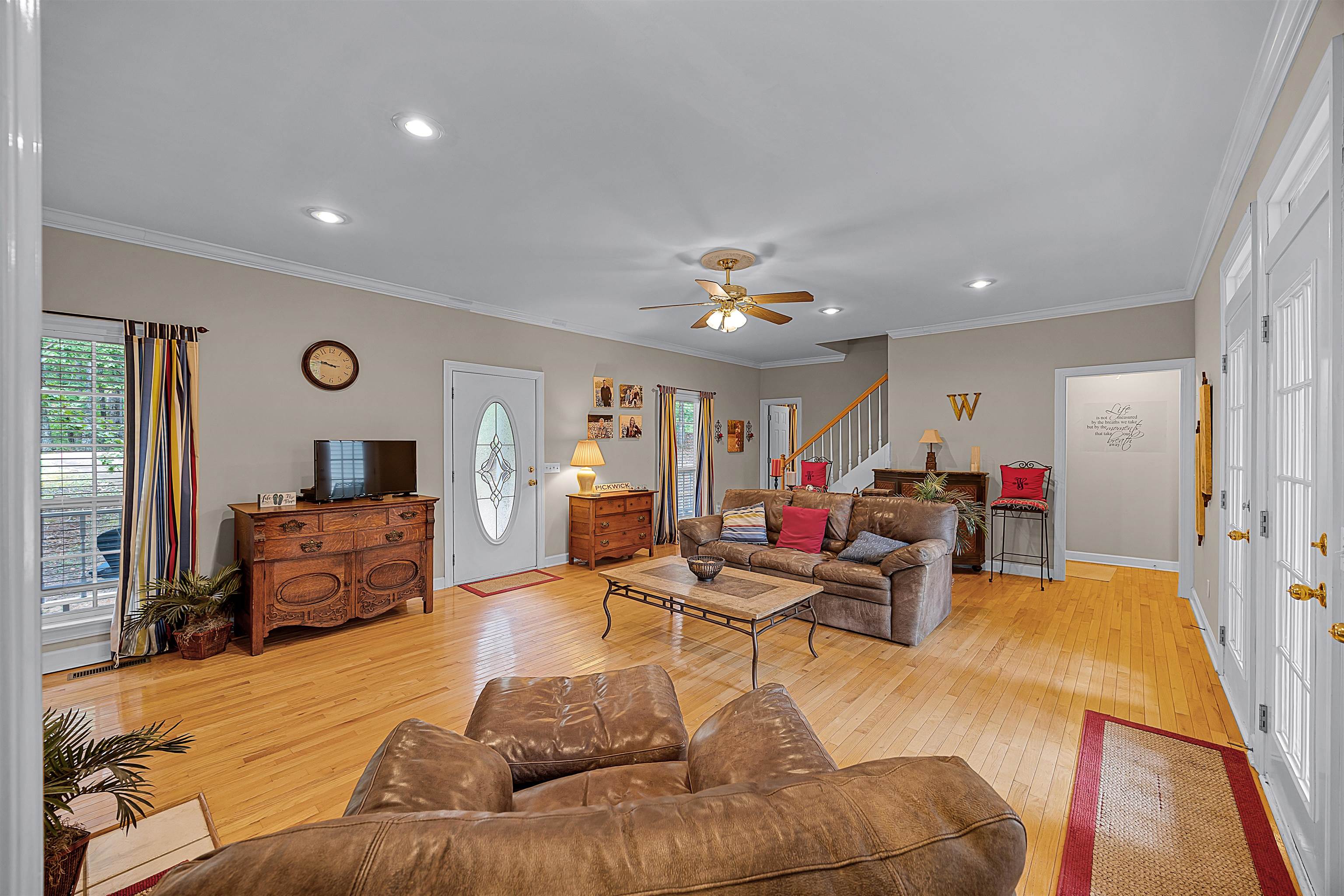 405 Anderson Hollow Road Savannah, TN 38372 - Photo 6 of 34 a living room with furniture and a wooden floor