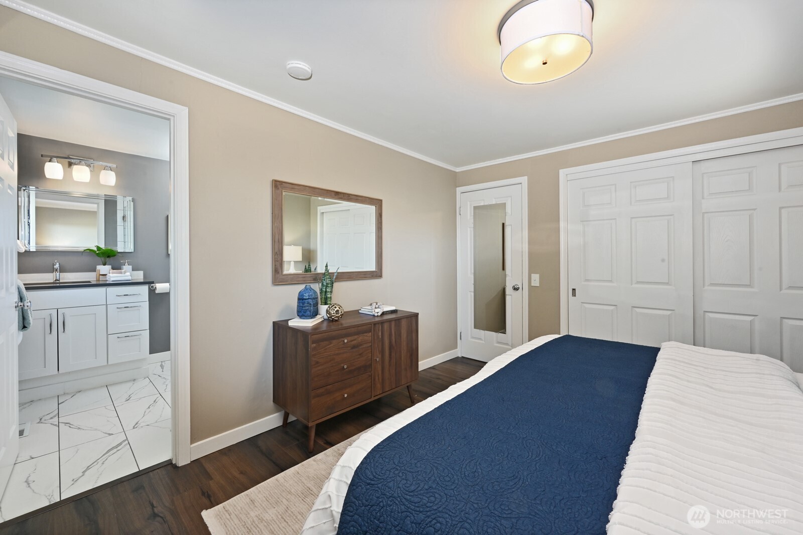 2525 South Raymond Street Seattle, WA 98108 - Photo 15 of 38 a bedroom with a bed and dresser