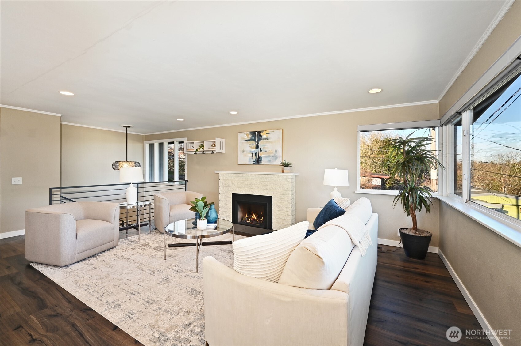 2525 South Raymond Street Seattle, WA 98108 - Photo 3 of 38 a living room with furniture a fireplace and a large window