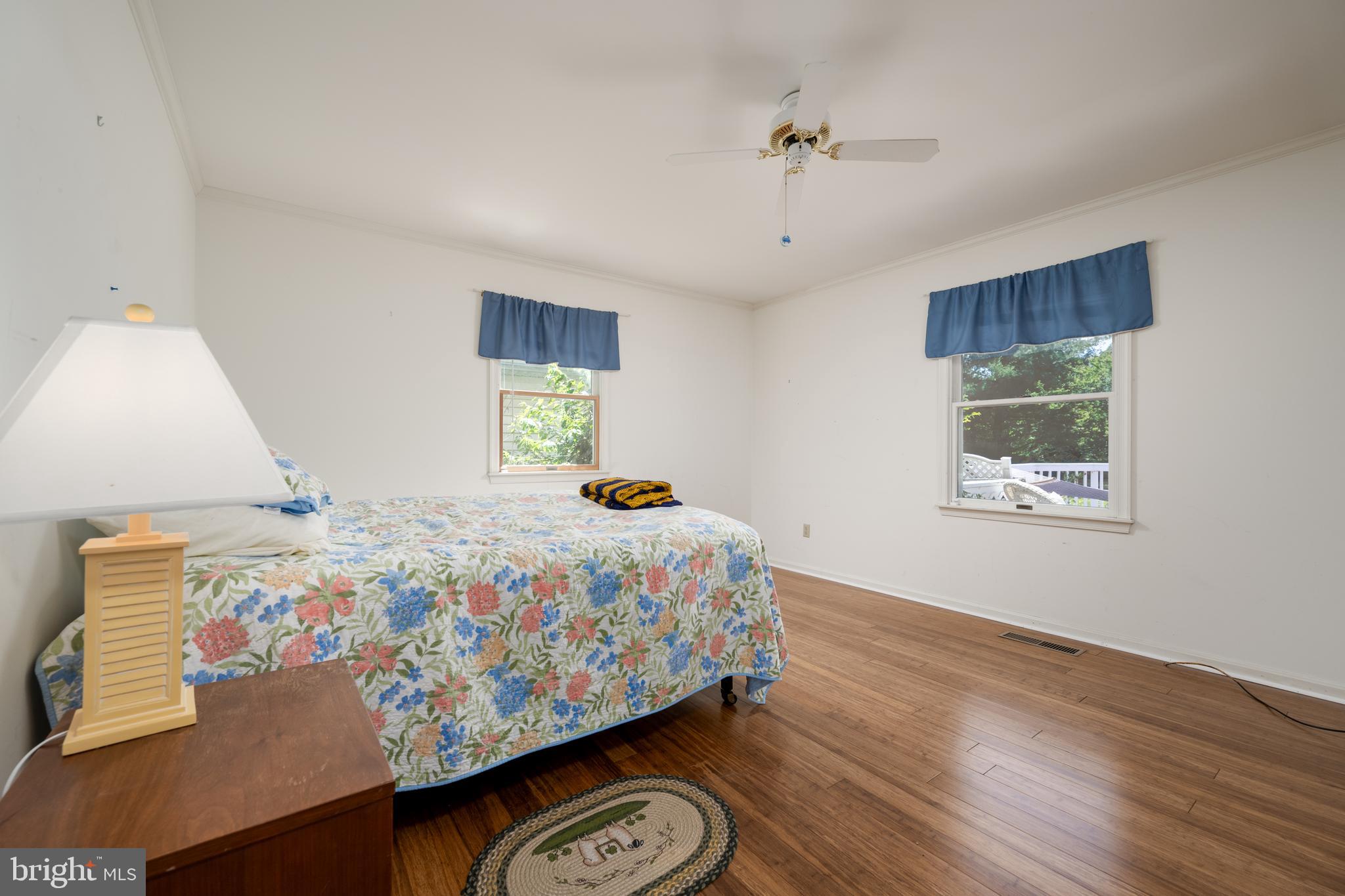 34122 Roxana Road Frankford, DE 19945 - Photo 49 of 65 2nd Bedroom with bamboo flooring and large closet