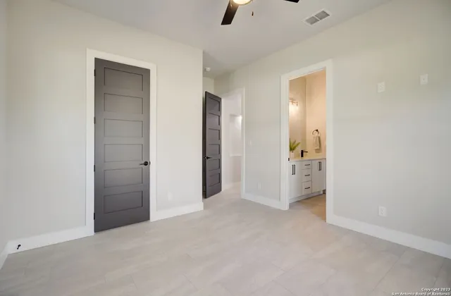 a bathroom with a bathtub and a toilet