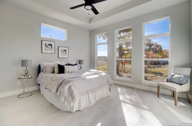 a bedroom with a bed and a cabinets