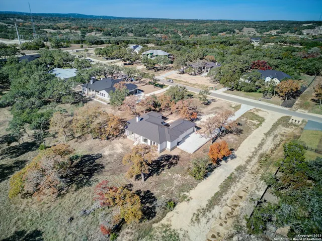 a view of a city with green space