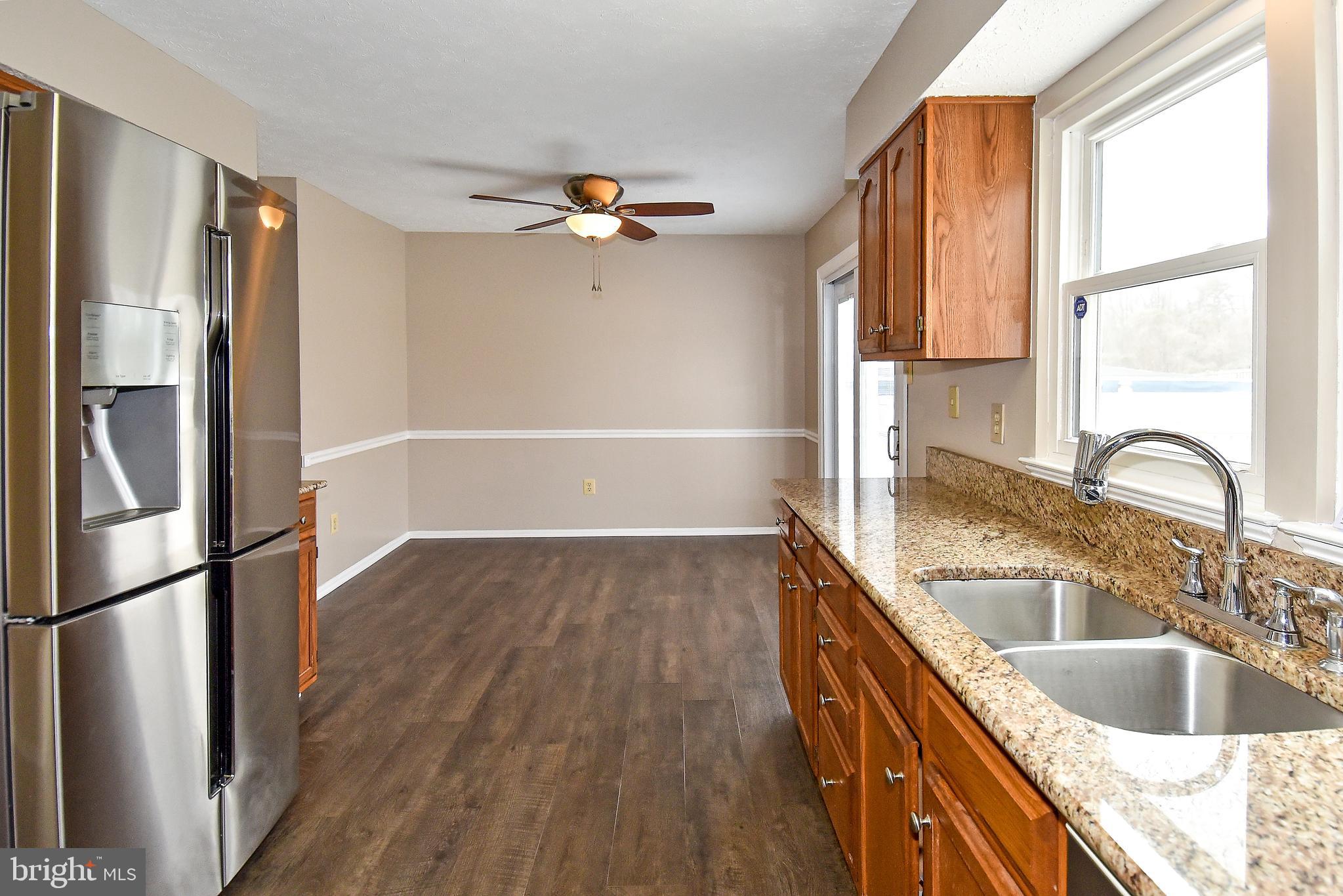 1867 Montreal Road Severn, MD 21144 - Photo 12 of 43 BREAKFAST ROOM HAS LIGHTED CEILING FAN