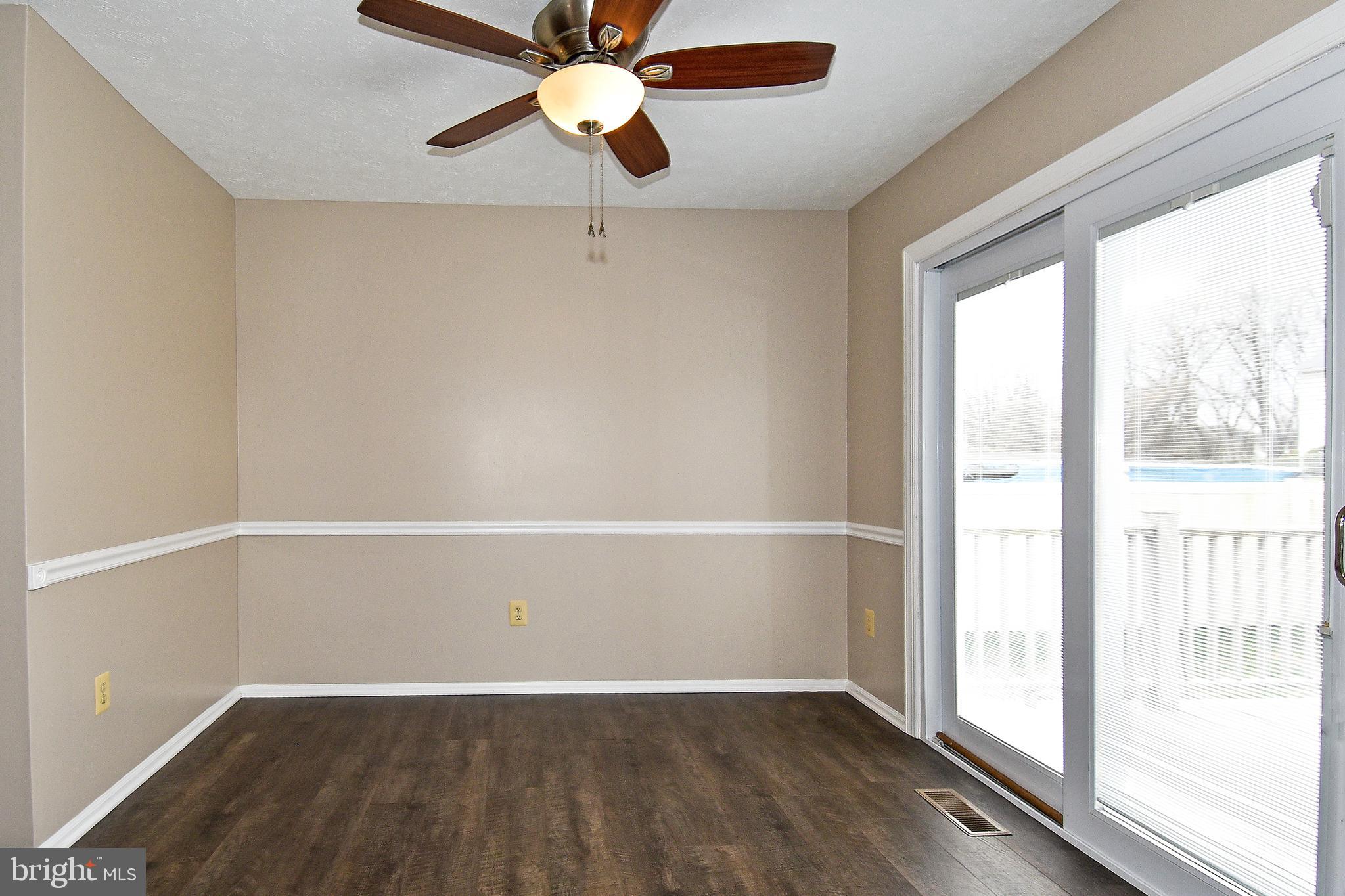 1867 Montreal Road Severn, MD 21144 - Photo 13 of 43 BREAKFAST ROOM SLIDER DOOR HAS ACCESS TO EXT DECK