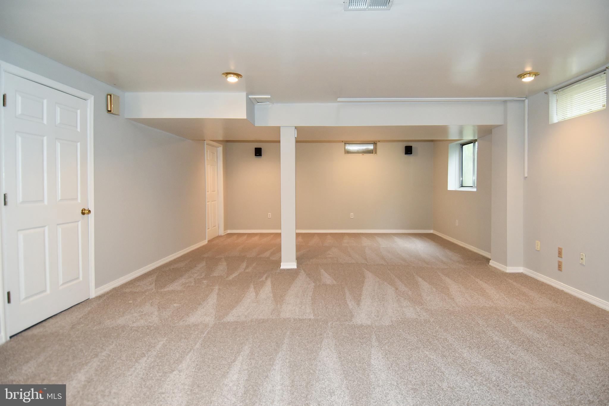 1867 Montreal Road Severn, MD 21144 - Photo 35 of 43 FULL VIEW OF LOWER LEVEL AND CLOSET ON LEFT