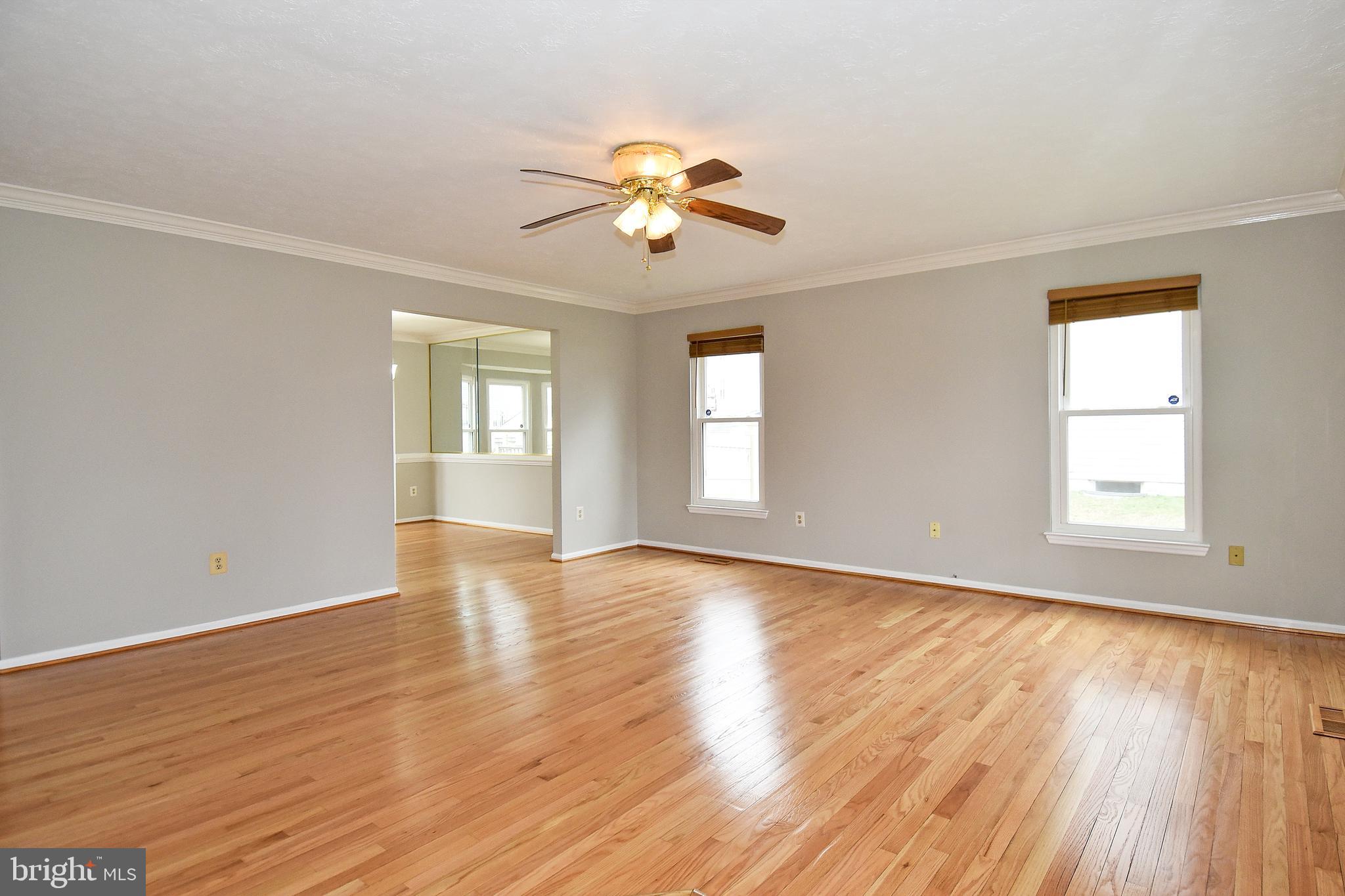 1867 Montreal Road Severn, MD 21144 - Photo 5 of 43 LIVING ROOM REFINISHED GLEAMING HARDWOOD FLOORS
