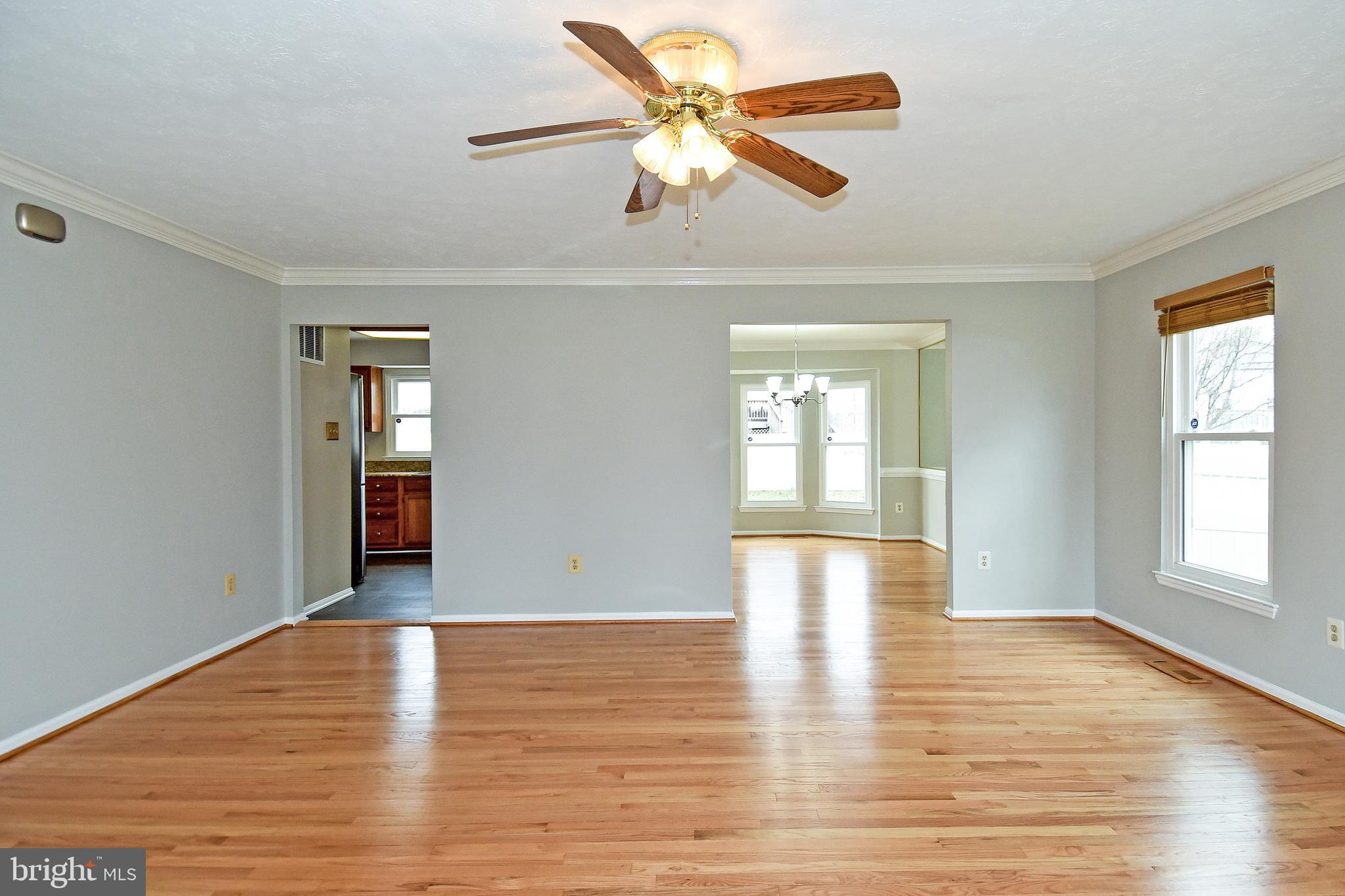 1867 Montreal Road Severn, MD 21144 - Photo 6 of 43 LIVING ROOM HAS LIGHTED CEILING FAN