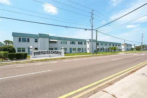 a view of a building with a street