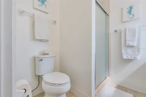 a bathroom with a toilet and a sink