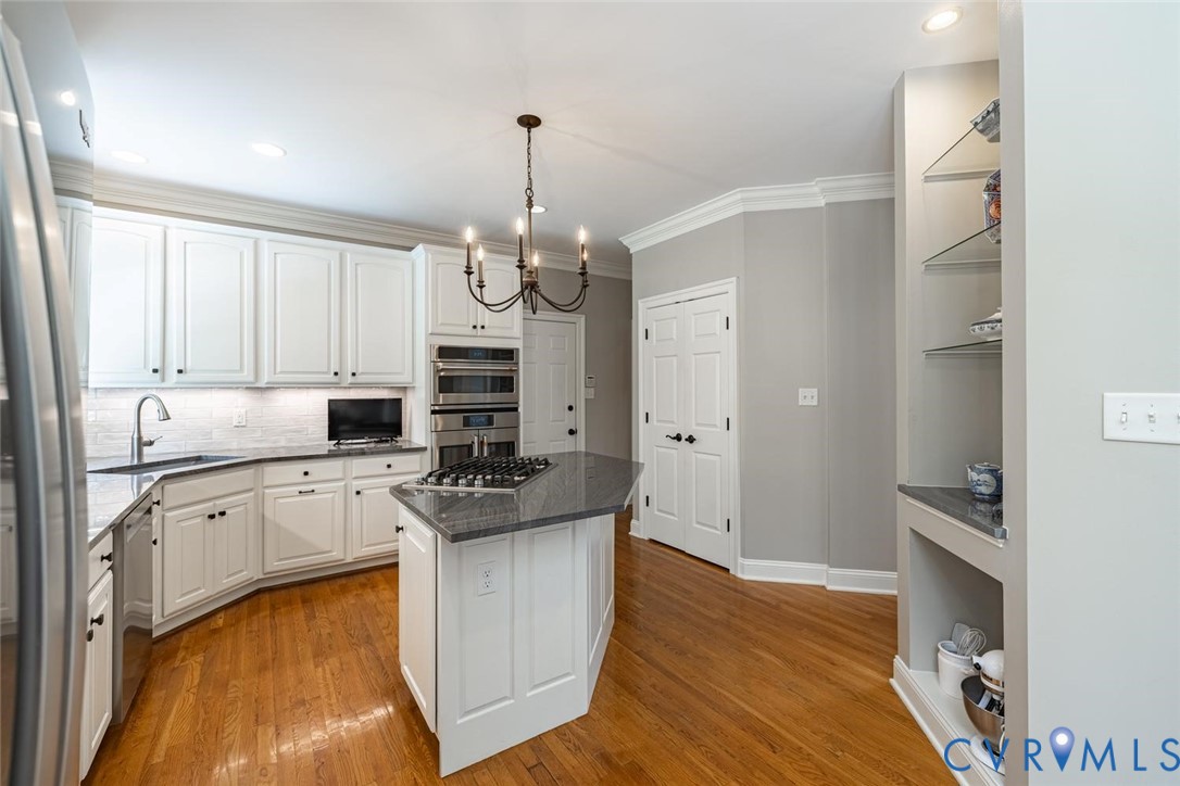 14469 Riverside Drive Ashland, VA 23005 - Photo 14 of 59 A nook with shelves for special kitchen items
