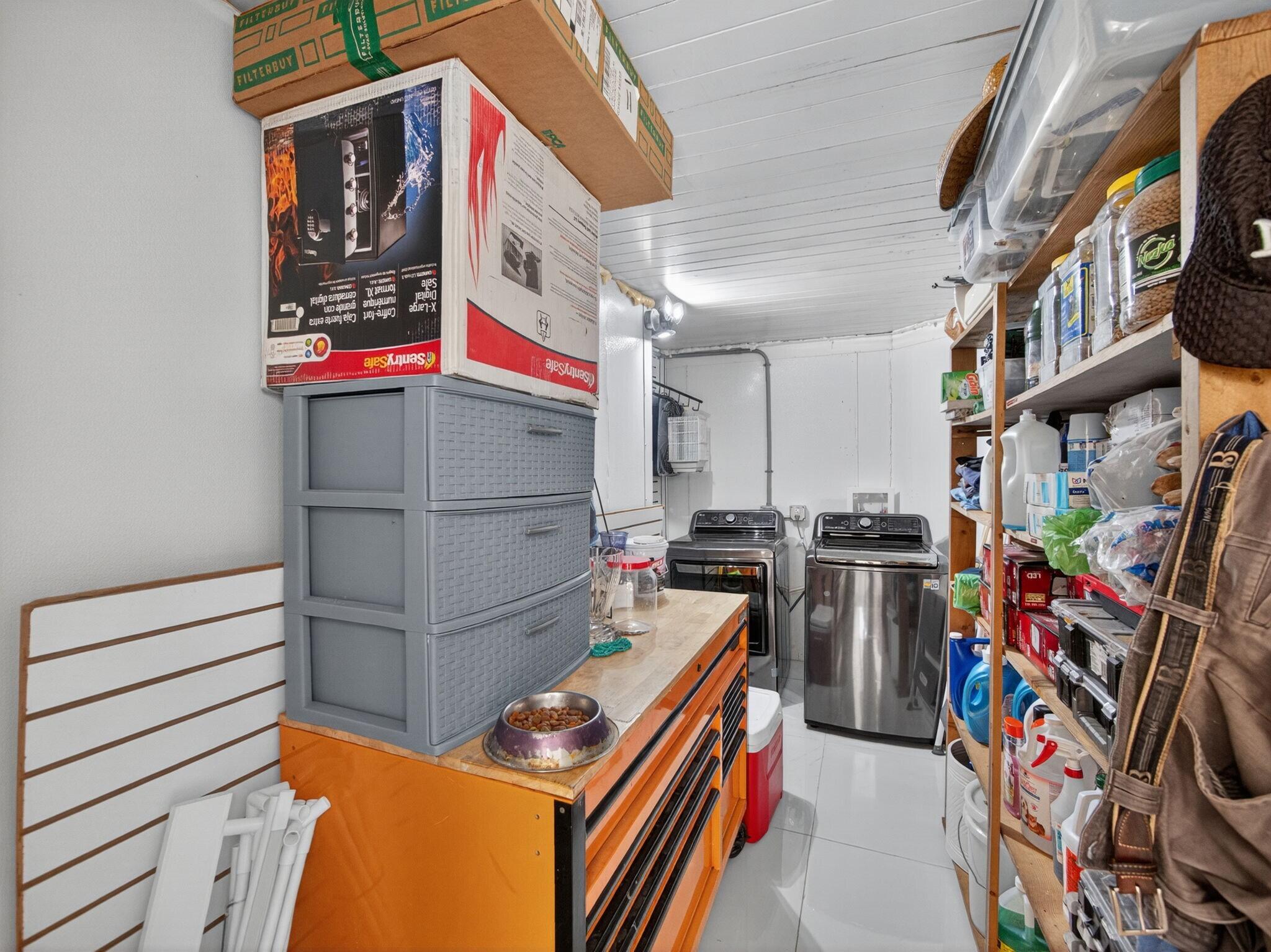 7026 Pine Tree Lane Lake Clarke Shores, FL 33406 - Photo 14 of 22 a storage utility room