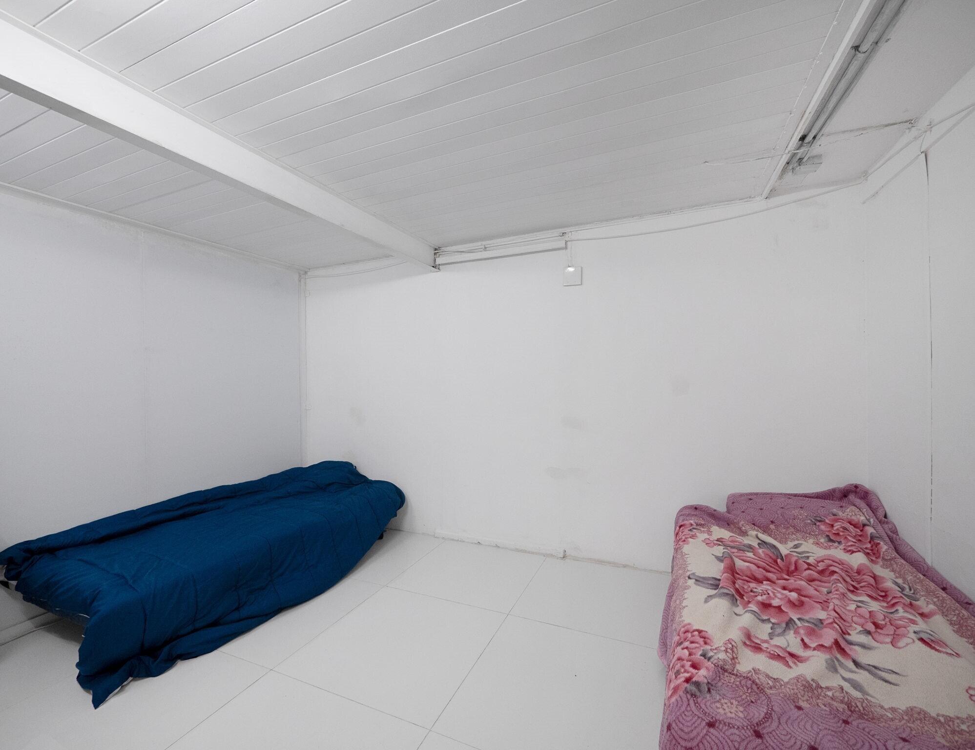 7026 Pine Tree Lane Lake Clarke Shores, FL 33406 - Photo 18 of 22 a room with a couch