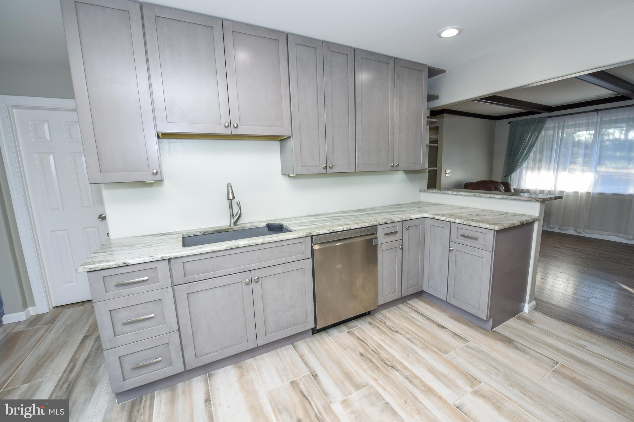 3010 Bath Road Bristol, PA 19007 - Photo 10 of 47 Handsome Granite plenty of upper & lower cabinets.