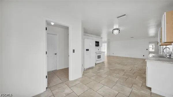 $2,200 | 918 Acroft Avenue, Lehigh Acres, FL 33971