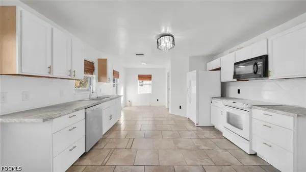 $2,200 | 918 Acroft Avenue, Lehigh Acres, FL 33971