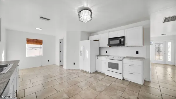 $2,200 | 918 Acroft Avenue, Lehigh Acres, FL 33971