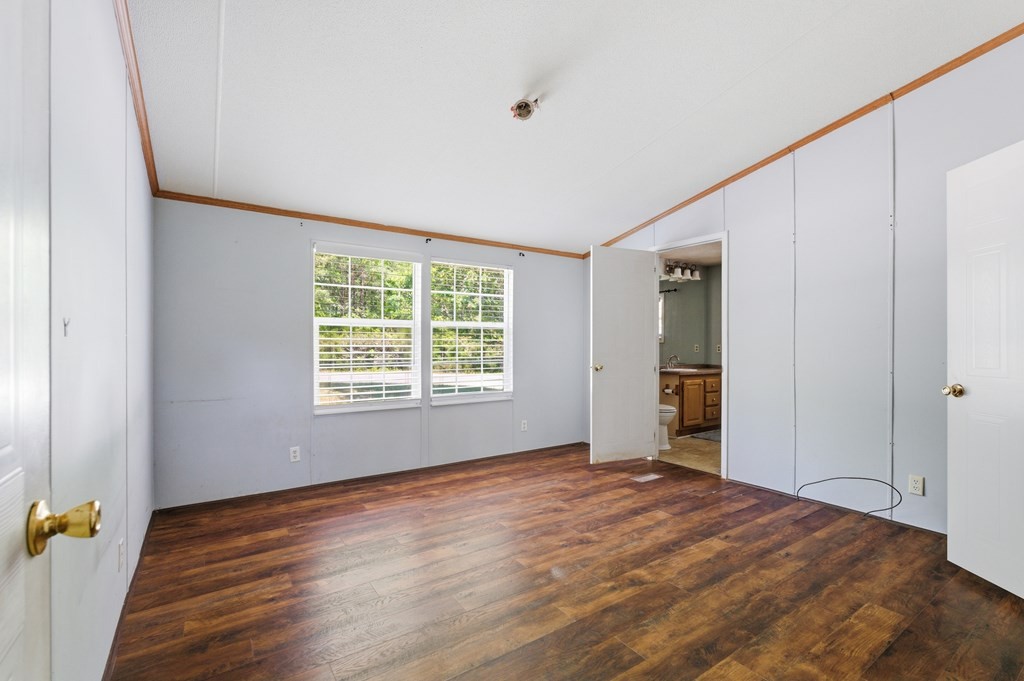611 Farmer Road Walling, TN 38587 - Photo 17 of 27 a view of an empty room with a window
