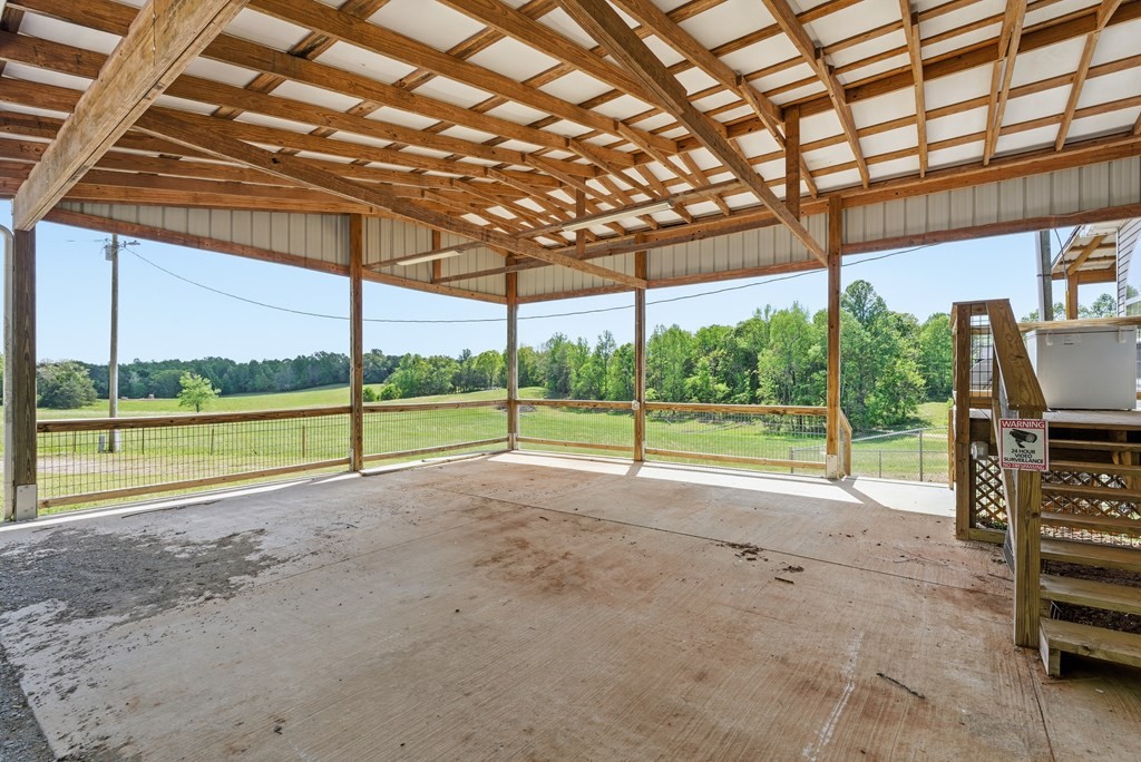 611 Farmer Road Walling, TN 38587 - Photo 24 of 27 a view of a room with porch and wooden stairs