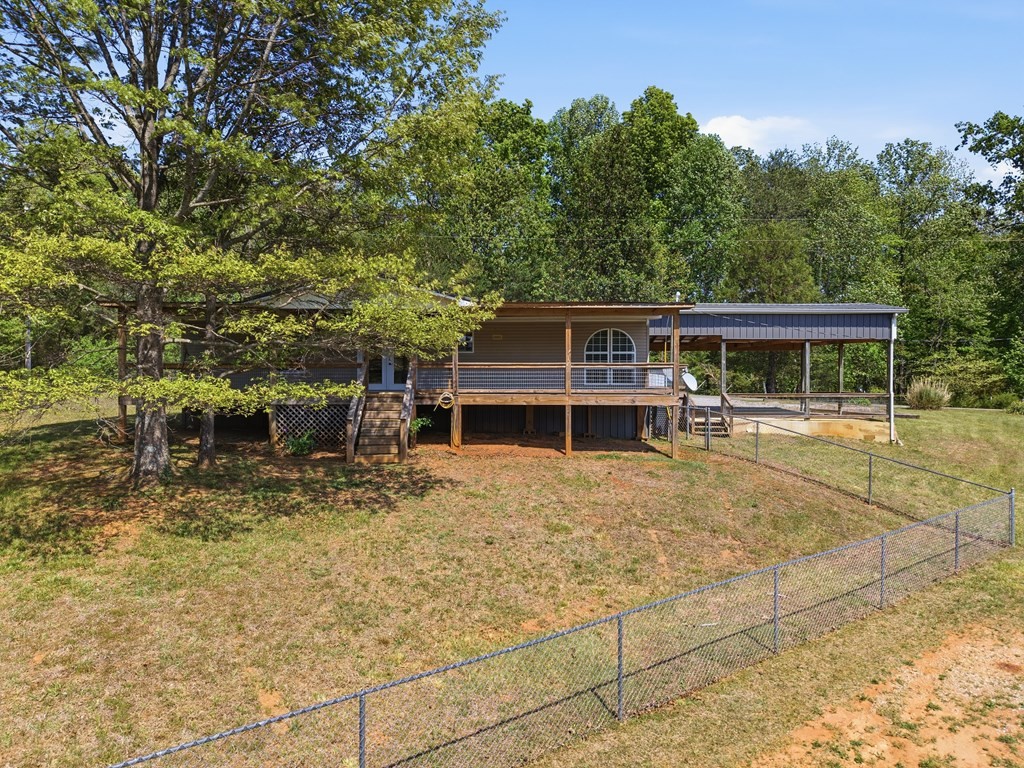 611 Farmer Road Walling, TN 38587 - Photo 5 of 27 a view of house with a yard