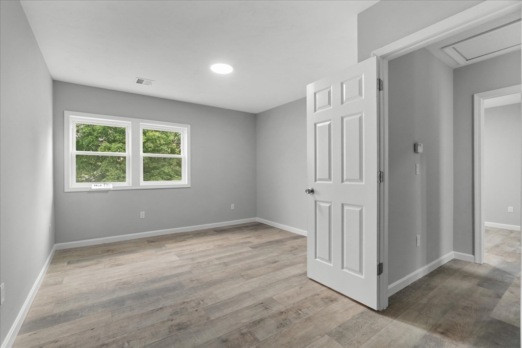19 Brandon Road Dudley, MA 01571 - Photo 28 of 42 an empty room with windows