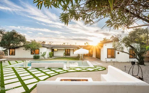 a front view of a house with a patio